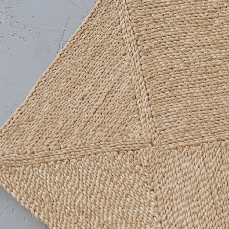 Our medium jute rugs are truly a work of love, and a work of art! Each of the squares in our rugs is handcrafted by our artisan partners in Bangladesh , then each piece is sewn  together in a gorgeous geometric pattern. These fair trade rugs are available in three sizes, runner, medium & large, ensuring the perfect fit for your space.