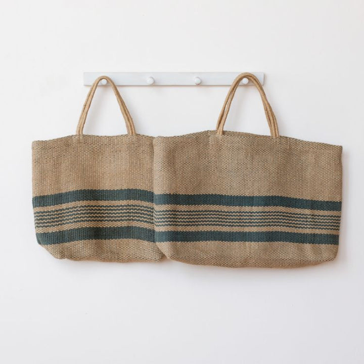 Eco-friendly jute tote bag in slate blue and natural color block design, perfect for groceries, books, beach items, and everyday essentials.