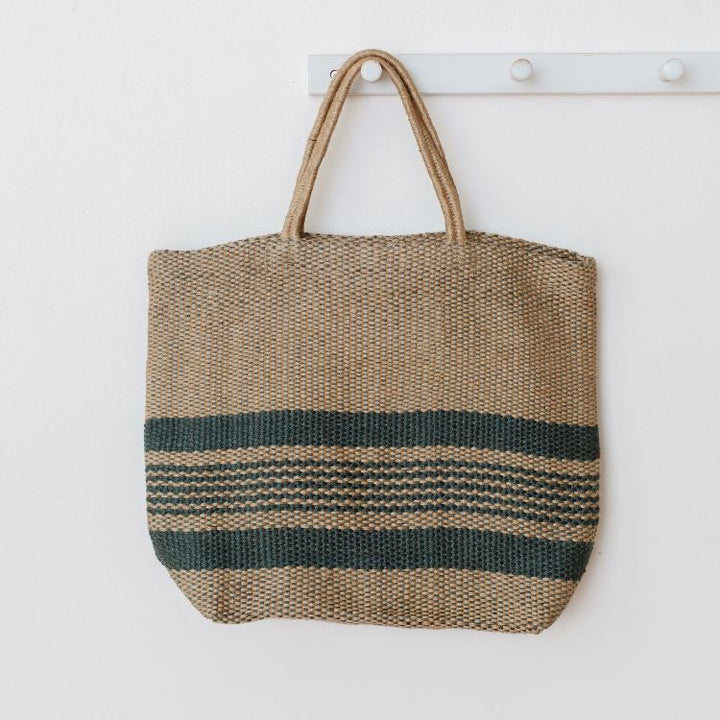 Eco-friendly jute tote bag in slate blue and natural color block design, perfect for groceries, books, beach items, and everyday essentials. 