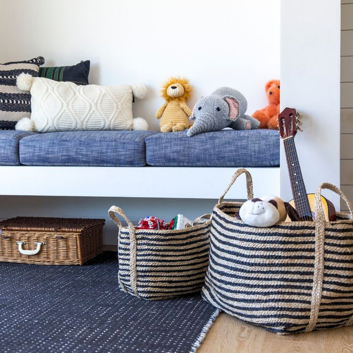 A terrific option for keeping organized, our large, charcoal striped jute baskets deliver on both form & function. Expertly handwoven by women working within a Fair Trade program in Bangladesh, they are built to stand up to the demands of your busy household. 