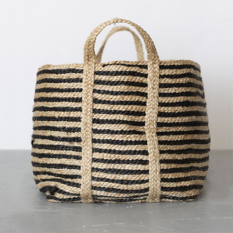 A terrific option for keeping organized, our large, charcoal striped jute baskets deliver on both form & function. Expertly handwoven by women working within a Fair Trade program in Bangladesh, they are built to stand up to the demands of your busy household. 