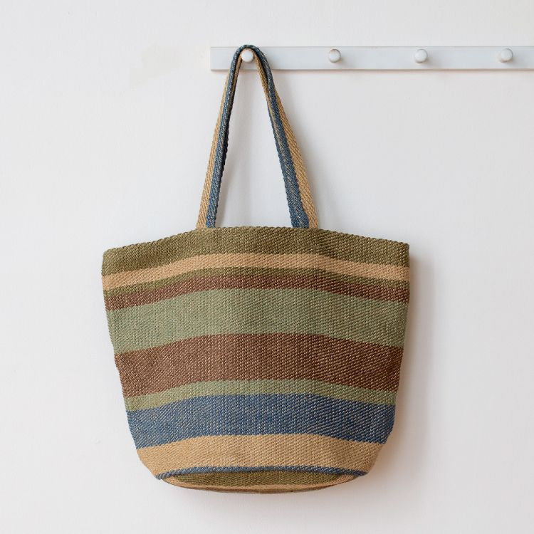 Our Sierra Striped Tote in Forest, handwoven with natural fibers.