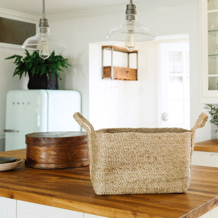 Our versatile jute basket in natural will accent any design aesthetic, from coastal to bohemian. And with flexible siding, our jute baskets can adapt to fit your space. 