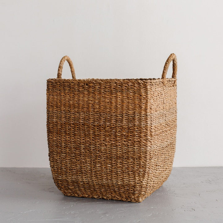 A mountain of laundry becomes a thing of beauty with these gorgeous laundry baskets. The Harvest laundry basket is handcrafted from hogla grass, an aquatic plant. Woven together, it creates a design that's both lightweight and strong, with layers of natural texture and tone. (large laundry basket)
