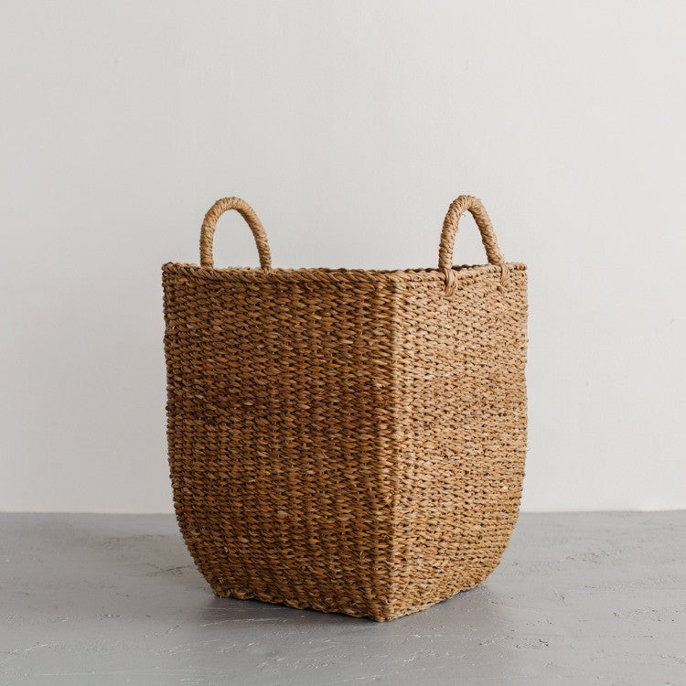 A mountain of laundry becomes a thing of beauty with these gorgeous laundry baskets. The Harvest laundry basket is handcrafted from hogla grass, an aquatic plant. Woven together, it creates a design that's both lightweight and strong, with layers of natural texture and tone. (medium laundry basket)
