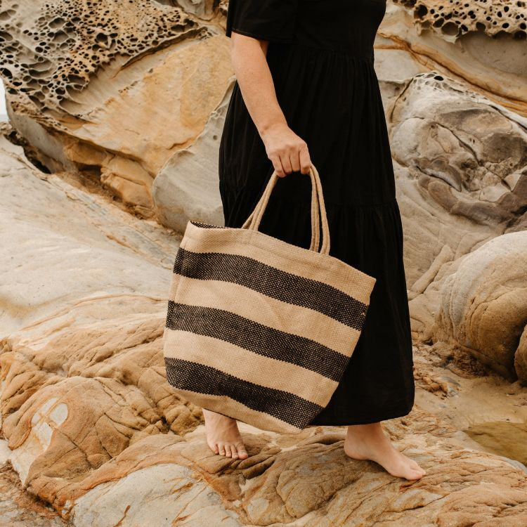 Stylish canvas tote bag with reinforced handles, perfect for groceries, books, and everyday essentials. The Brooklyn Market Shopper features a versatile black and natural design, by Will & Atlas.