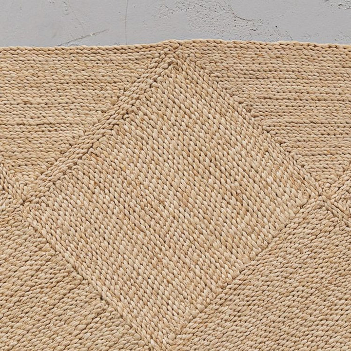 Our large jute rugs are truly a work of love, and a work of art! Each of the squares in our rugs is handcrafted by our artisan partners in Bangladesh , then each piece is sewn  together in a gorgeous geometric pattern. These fair trade rugs are available in three sizes, runner, medium & large, ensuring the perfect fit for your space.