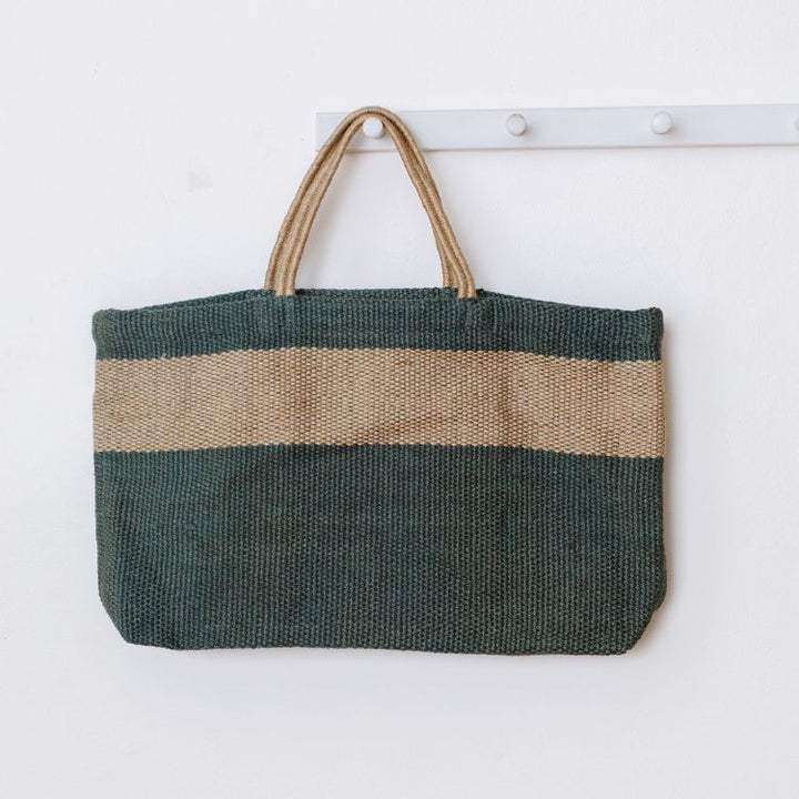 Eco-friendly jute tote bag in natural stripe and charcoal color design. Available in two sizes - Original Shopper and Wide Market Shopper. Perfect for carrying your groceries, books, beach essentials, or everyday items