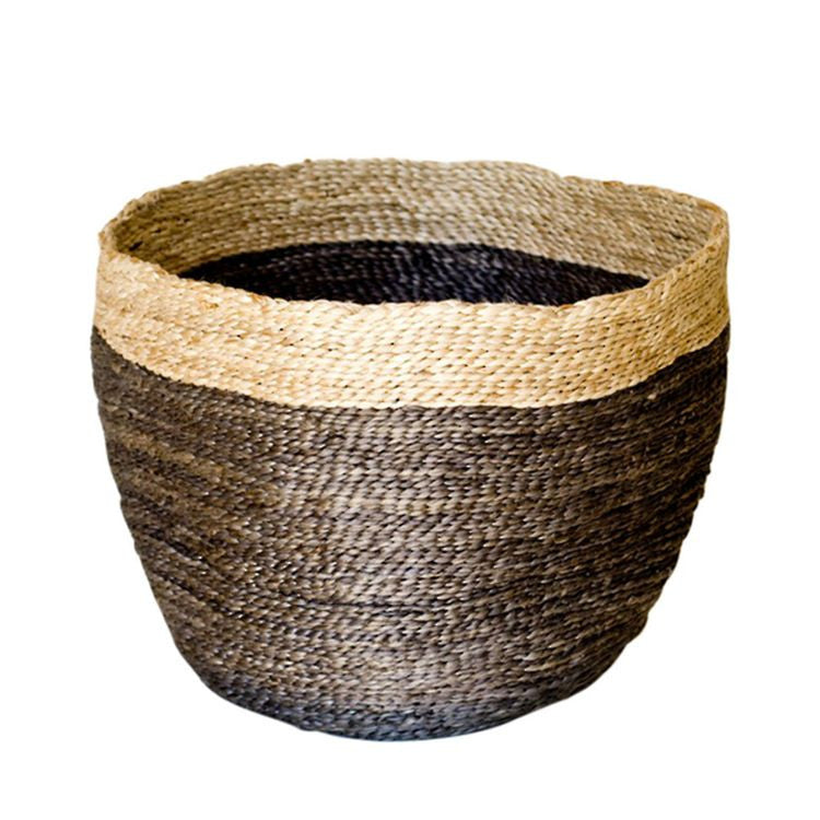 Our Jute Bowl in charcoal with natural trim is a beautiful and versatile accessory that will add texture and warmth to any space.