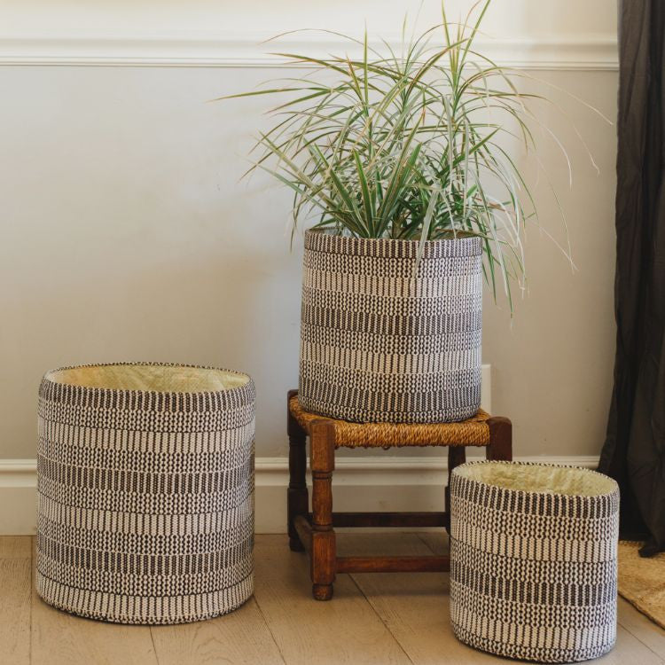 These handwoven round storage baskets in Kalied pattern are perfectly suited for an array of purposes, like storage for winter gear, a catch-all for laundry, or as a cozy nest for your child’s stuffed animals. Offered in three sizes, small, medium and large. 