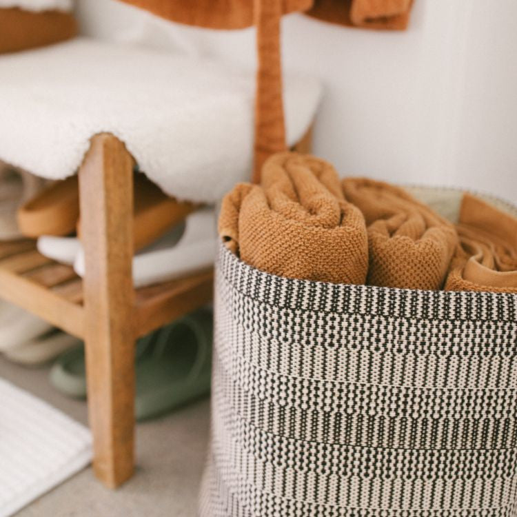 Our set of round storage baskets is a trifecta of style and functionality. These handwoven round storage baskets in Kalied pattern are perfectly suited for an array of purposes, like storage for winter gear, a catch-all for laundry, or as a cozy nest for your child’s stuffed animals. Offered in three sizes, small, medium and large. 