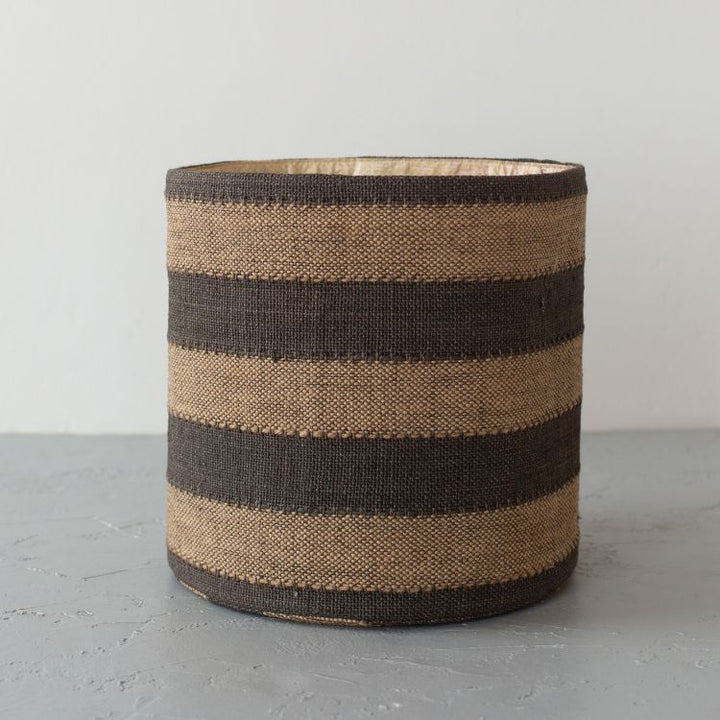 Single handwoven natural cotton, Jute lined, round storage basket with black stripes Perfect for storing toys, beauty products, or pantry items.
