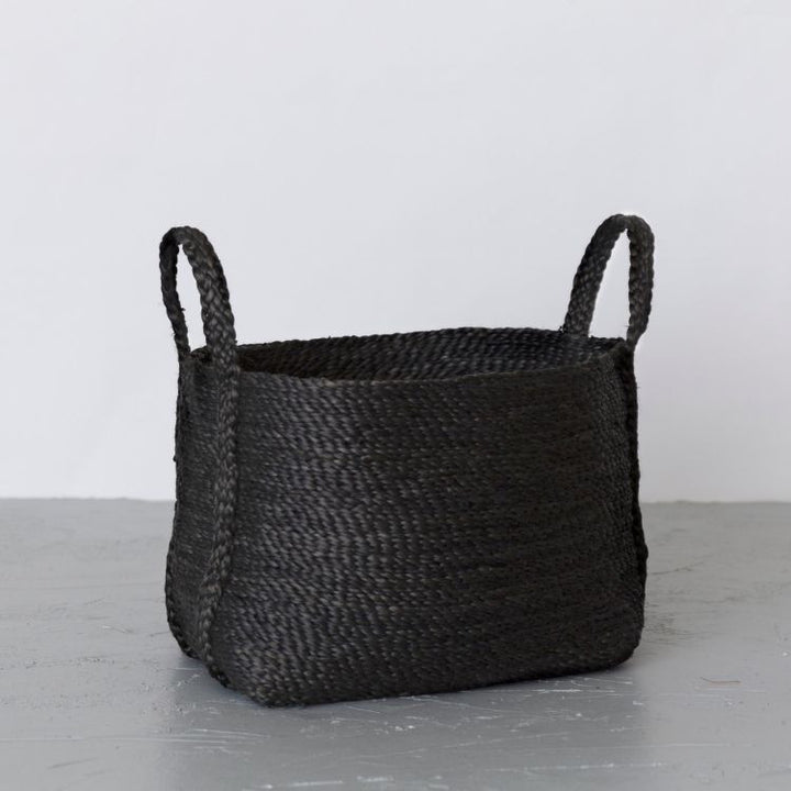 Our versatile jute basket in black will accent any design aesthetic, from coastal to bohemian. And with flexible siding, our jute baskets can adapt to fit your space. 