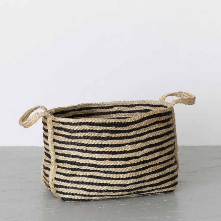 Our versatile jute basket in stripes will accent any design aesthetic, from coastal to bohemian. And with flexible siding, our jute baskets can adapt to fit your space. 