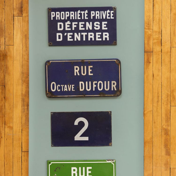 Terrific vintage French street sign "2". This authentic enameled metal piece is sourced from France and features a beautiful weathered patina. Perfect for any room in your home.