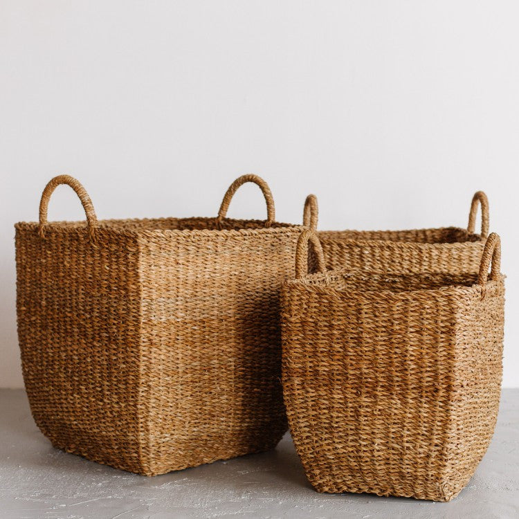 A mountain of laundry becomes a thing of beauty with these gorgeous laundry baskets. The Harvest laundry basket is handcrafted from hogla grass, an aquatic plant. Woven together, it creates a design that's both lightweight and strong, with layers of natural texture and tone.

